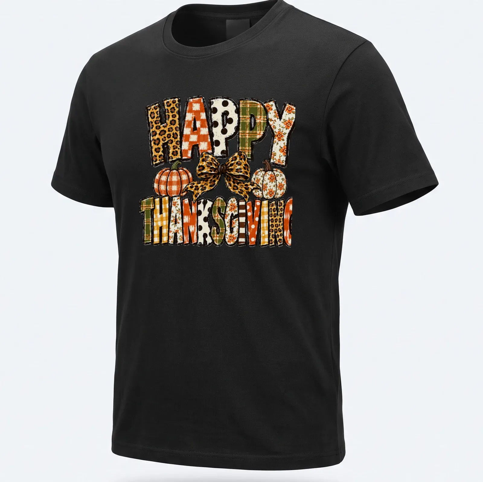 Leopard bow over pumpkins with "Happy Thanksgiving" text in festive colors — printed on a unisex t-shirt