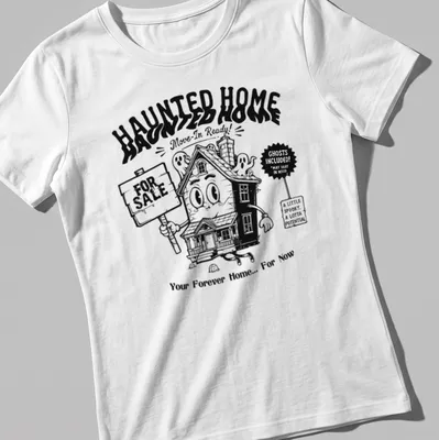 Kawaii line-art haunted house t-shirt with cheerful ghosts and playful text — printed on a women's shirt