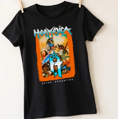 Colorful comic-style print featuring historical characters and the word HERMÉNICA — printed on a women's shirt
