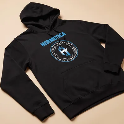 Modern graphic HERMETICA t-shirt with star and lightning bolt design in light blue and white — printed on a unisex hoodie