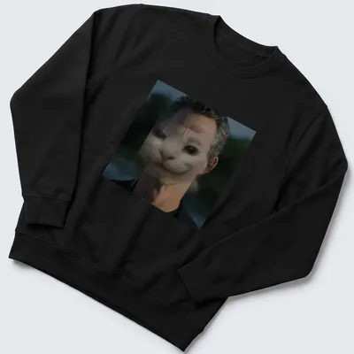 Surreal print featuring a cat face merging with a human face in gray and black — printed on a unisex sweatshirt