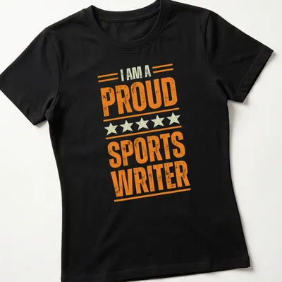 Vintage distressed shirt with the phrase I AM A PROUD SPORTS WRITER in orange and light green — printed on a women's shirt