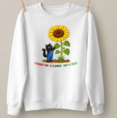 Cartoon black cat with colorful flowers and tree branches, text humorously stating what was asked for. — printed on a unisex sweatshirt