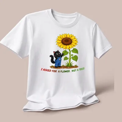 Cartoon black cat with colorful flowers and tree branches, text humorously stating what was asked for. — printed on a unisex t-shirt (angled view)