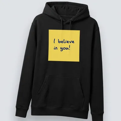 Playful illustration of a sticky note with the text 'I believe in you!' in yellow and blue. — printed on a unisex hoodie