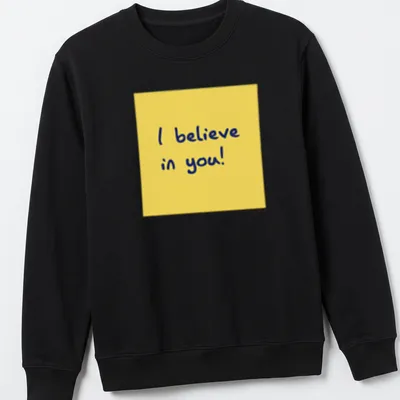 Playful illustration of a sticky note with the text 'I believe in you!' in yellow and blue. — printed on a unisex sweatshirt