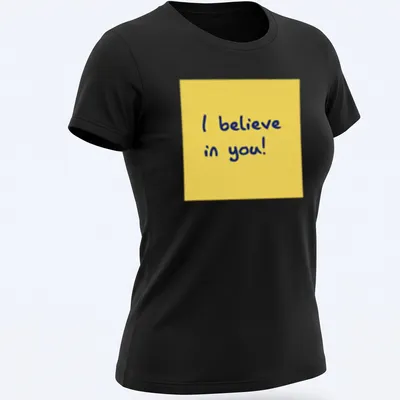 Playful illustration of a sticky note with the text 'I believe in you!' in yellow and blue. — printed on a women's shirt