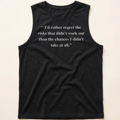 Inspirational text about taking risks printed on a — printed on a tank top