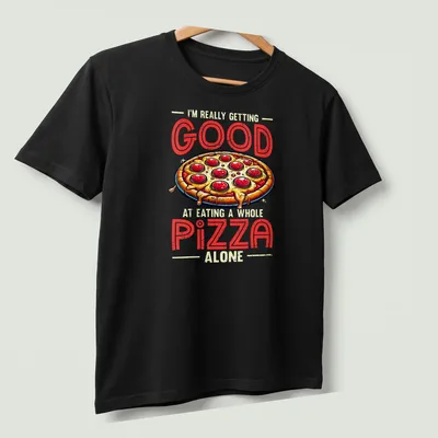 Vintage cartoon t-shirt featuring a playful pizza graphic and humorous text. — printed on a unisex t-shirt (angled view)
