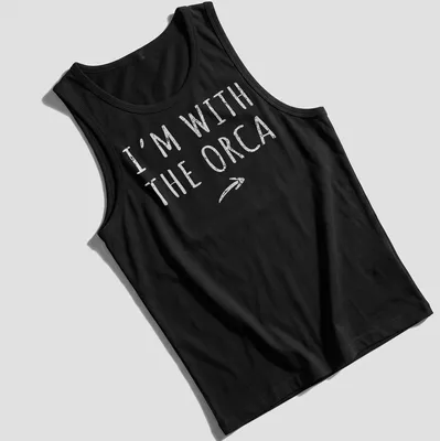 Playful orca-themed shirt with bold text 'I'm With The Orca' for Halloween — printed on a tank top