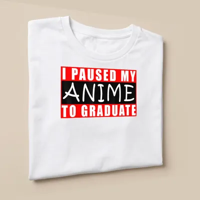 Bold text t-shirt saying I Paused My Anime To Graduate in red, black, and white. — printed on a unisex t-shirt (angled view)