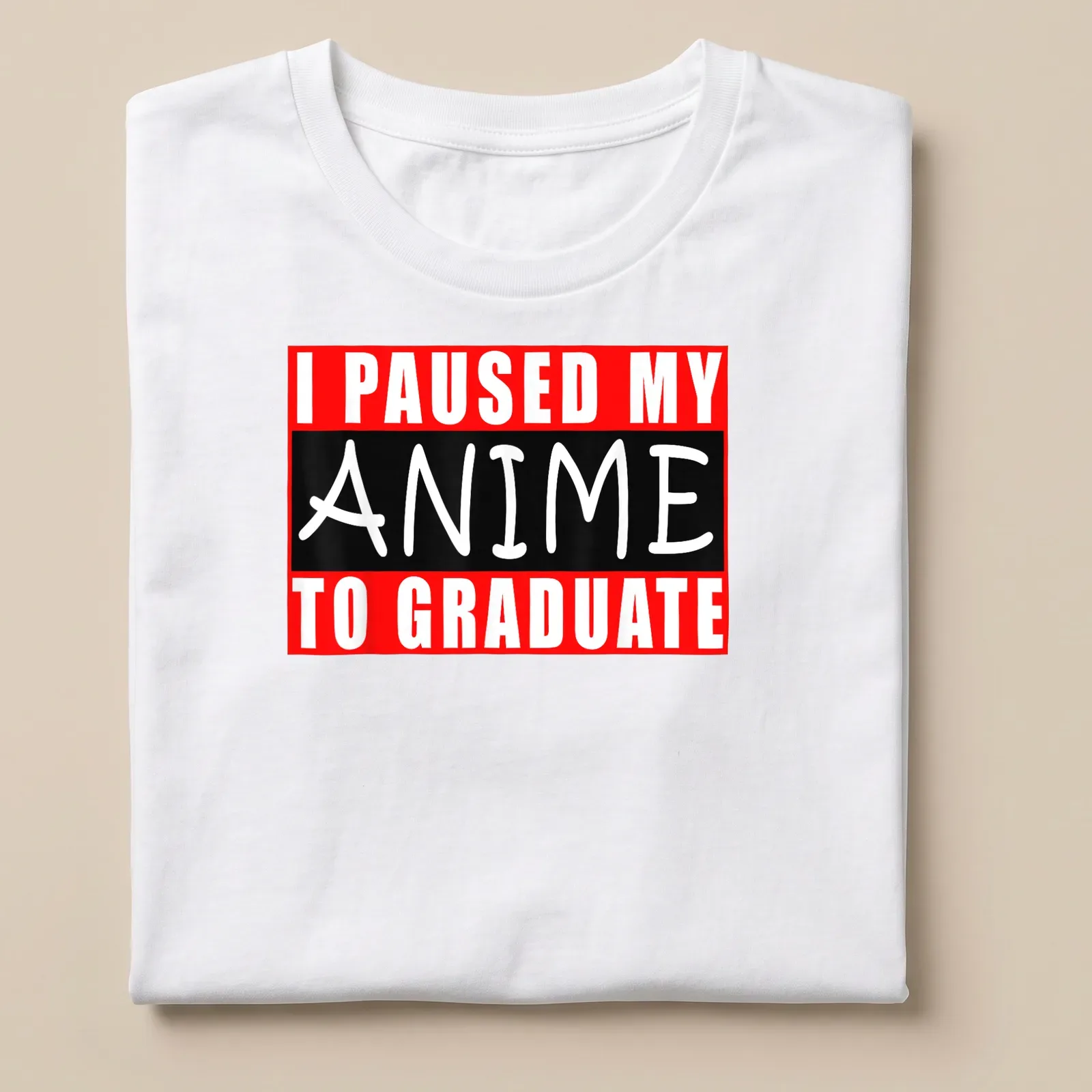Bold text t-shirt saying I Paused My Anime To Graduate in red, black, and white. — printed on a unisex t-shirt