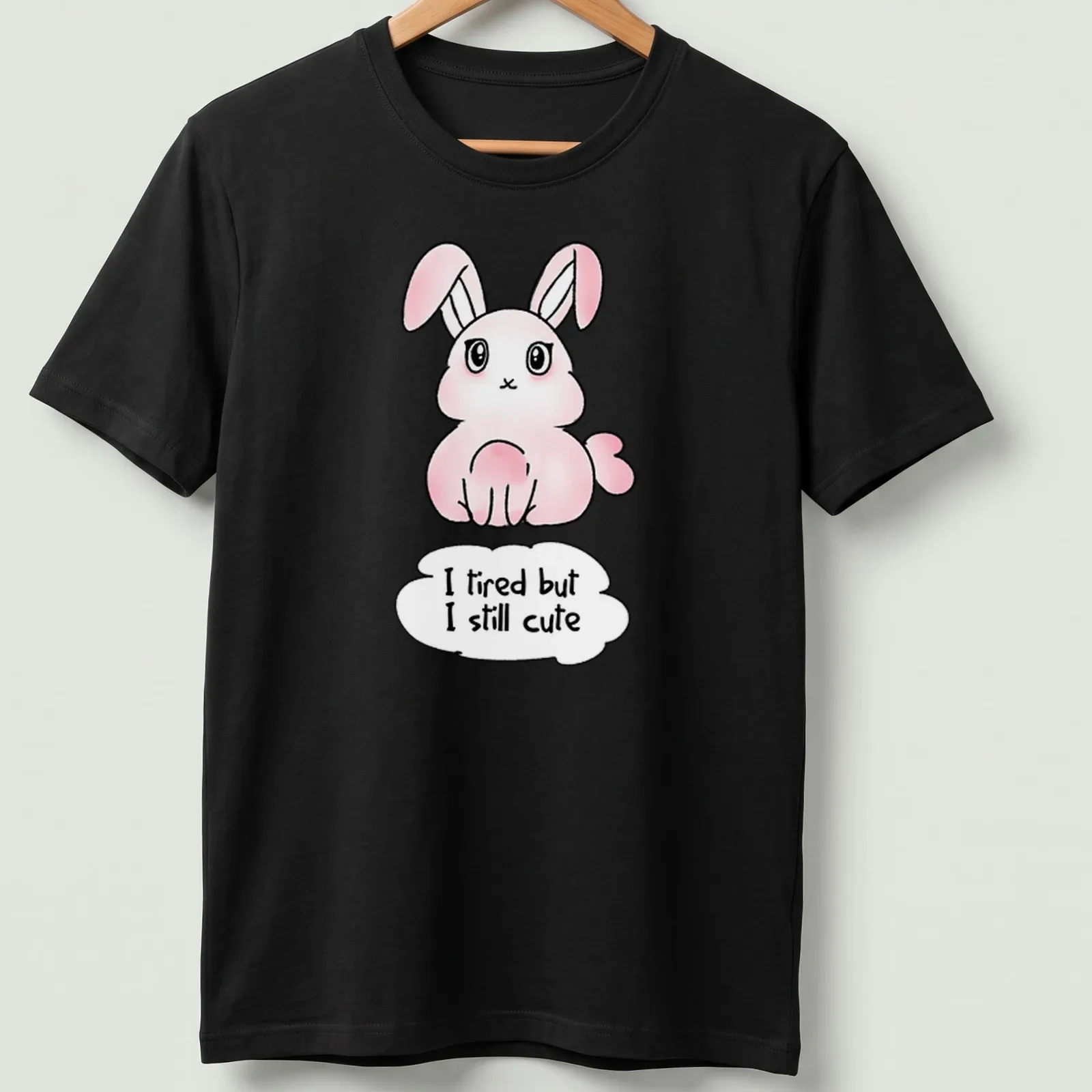 Kawaii pink bunny t-shirt with playful text about being cute despite tiredness. — printed on a unisex t-shirt