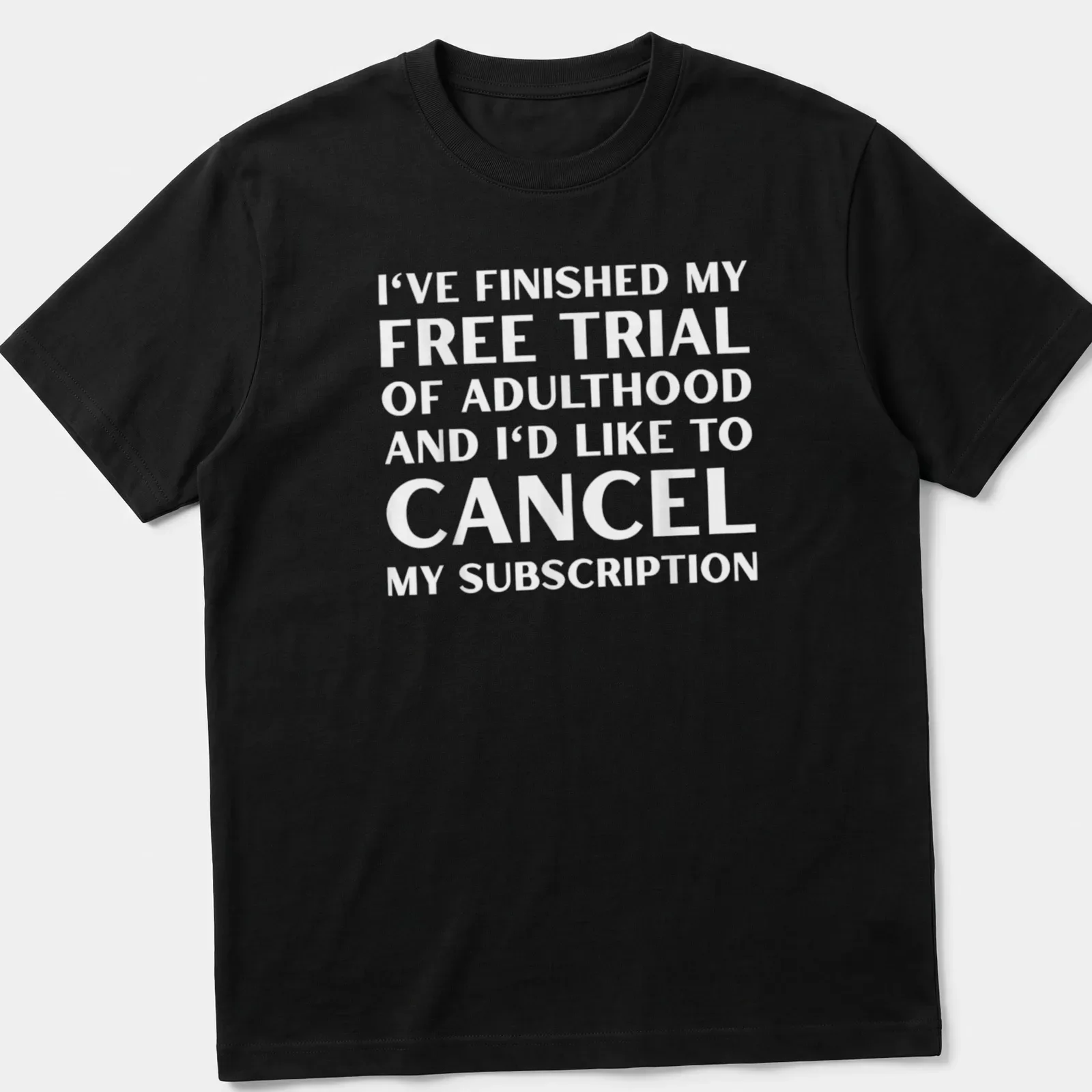 Bold typography humor about canceling adulthood subscription in black and white — printed on a unisex t-shirt