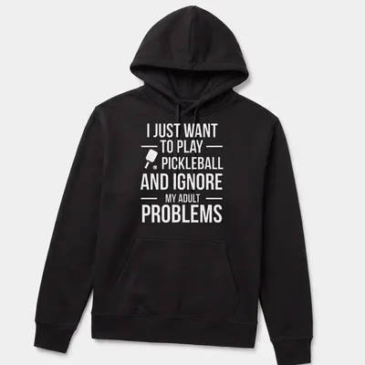 Typography t-shirt with the phrase about ignoring adult problems to play pickleball and a cartoon player — printed on a unisex hoodie