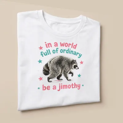 Vintage illustrated raccoon with whimsical text about being unique — printed on a unisex t-shirt (angled view)