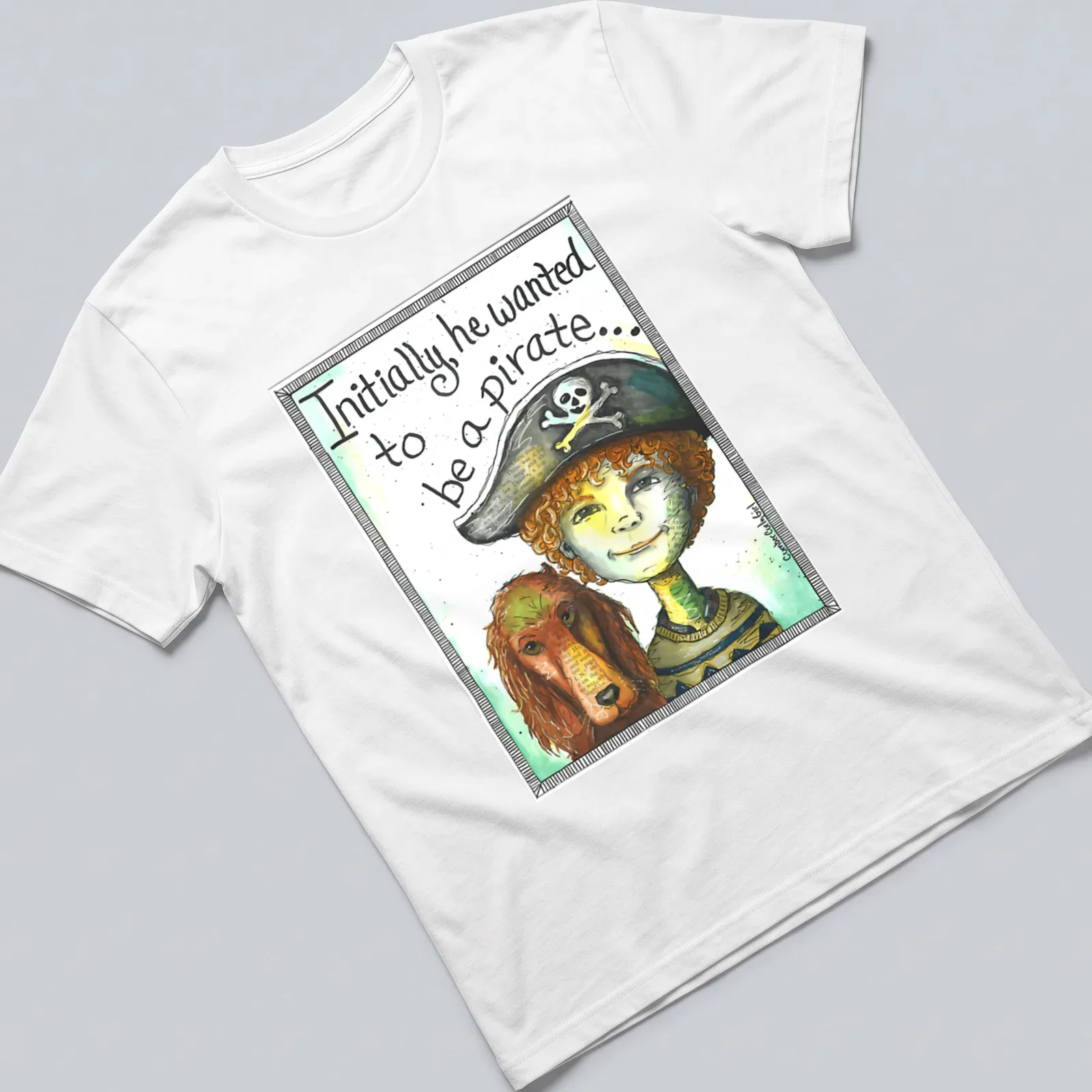 Watercolor illustration of a boy with a pirate hat and dog, with whimsical text — printed on a unisex t-shirt