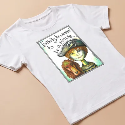 Watercolor illustration of a boy with a pirate hat and dog, with whimsical text — printed on a women's shirt