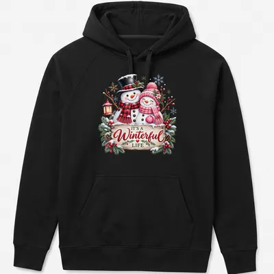 Festive snowman couple with text 'IT'S A Winterful Life' in colorful holiday design. — printed on a unisex hoodie