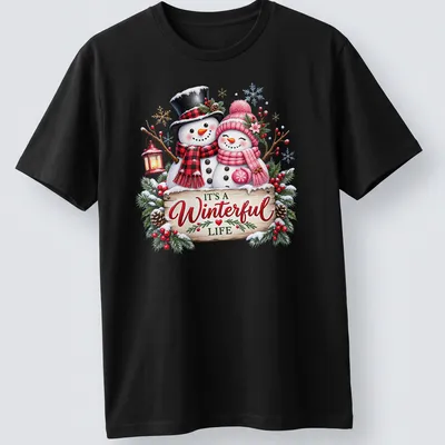 Festive snowman couple with text 'IT'S A Winterful Life' in colorful holiday design. — printed on a unisex t-shirt