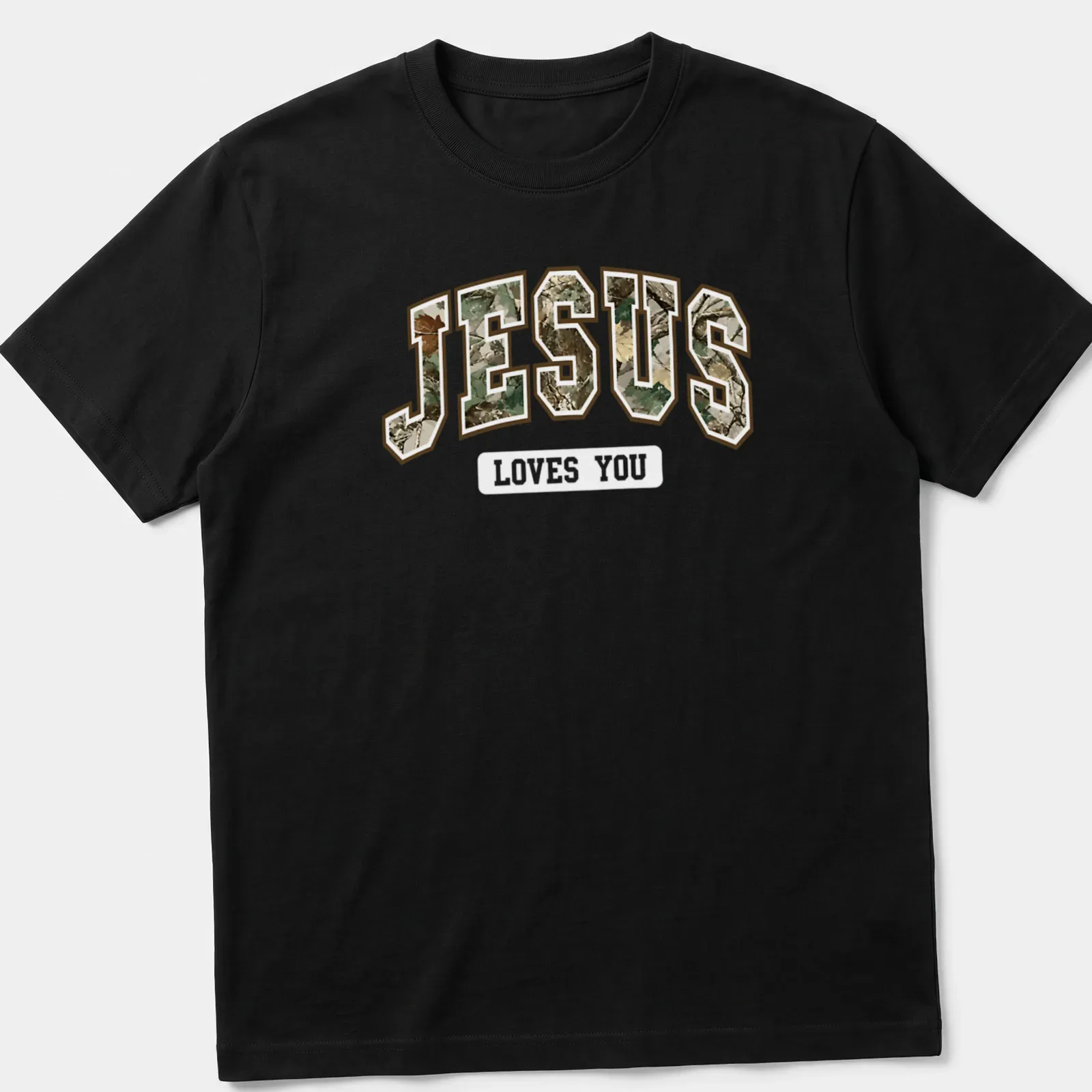 Camo print t-shirt featuring 'JESUS' in camouflage text — printed on a unisex t-shirt