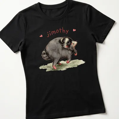 Watercolor print of a cute raccoon named Jimothy with playful text. — printed on a women's shirt