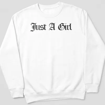 Black gothic lettering on a t-shirt reads Just A Girl — printed on a unisex sweatshirt