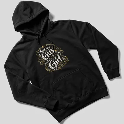 Vintage t-shirt with ornate typography 'Just the Guy with the Girl' in gold, white, and black. — printed on a unisex hoodie