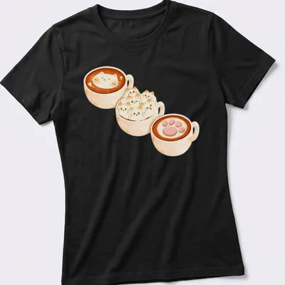 Kawaii print of cat lattes in cozy coffee cups with frothy artwork — printed on a women's shirt