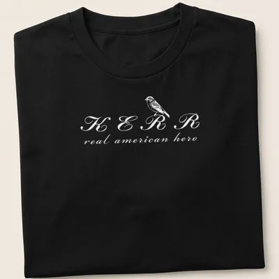 Simple line-art depiction of a bird with text KERR real american hero in white — printed on a unisex t-shirt