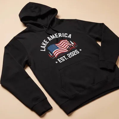 Vintage distressed Lake America shirt with American flag and trees in red, white, blue, and green — printed on a unisex hoodie