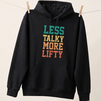 Retro distressed gym t-shirt with bold slogan in vibrant colors — printed on a unisex hoodie
