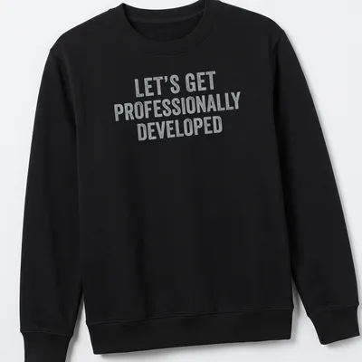 Bold distressed text t-shirt with a humorous professional development quote — printed on a unisex sweatshirt