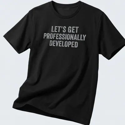 Bold distressed text t-shirt with a humorous professional development quote