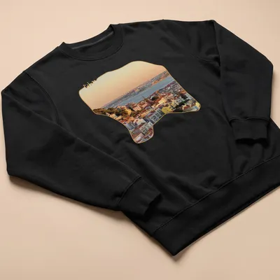 Photographic print of Lisbon's cityscape at sunset with vibrant colors — printed on a unisex sweatshirt