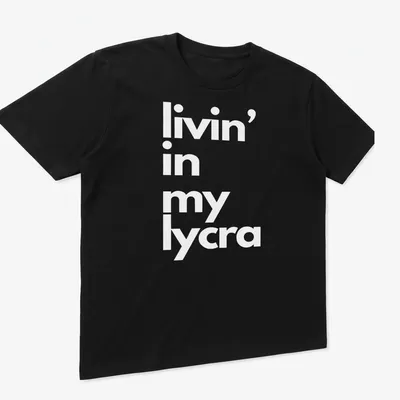 Typography t-shirt with the phrase 'livin' in my lycra' in bold letters — printed on a unisex t-shirt (angled view)