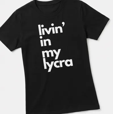 Typography t-shirt with the phrase 'livin' in my lycra' in bold letters — printed on a women's shirt