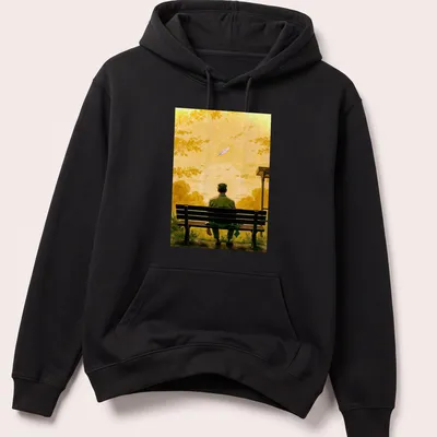 Illustration of a lonely man on a bench watching a sunset in yellow and green tones. — printed on a unisex hoodie