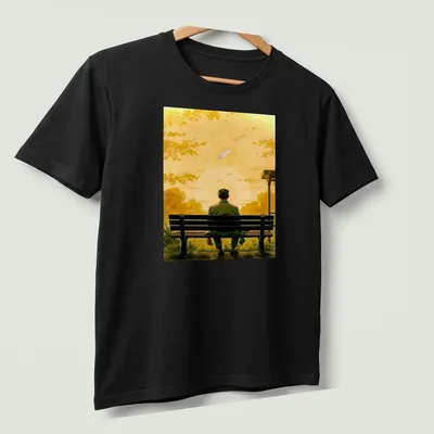 Illustration of a lonely man on a bench watching a sunset in yellow and green tones. — printed on a unisex t-shirt (angled view)