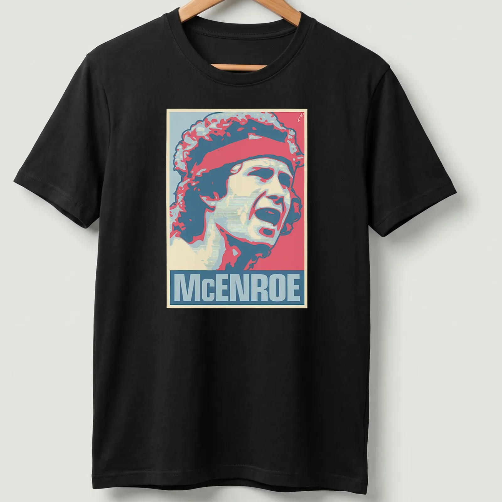 Vintage pop art portrait of John McEnroe in red, blue, cream, and pink — printed on a unisex t-shirt