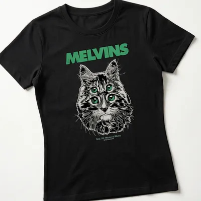 Illustrative print of a four-eyed cat with Melvins concert details in black, green, and white — printed on a women's shirt
