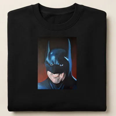 Realistic portrait of Batman in blue, black, red, and white colors — printed on a unisex sweatshirt