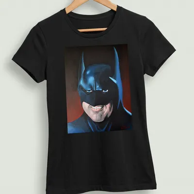 Realistic portrait of Batman in blue, black, red, and white colors — printed on a women's shirt