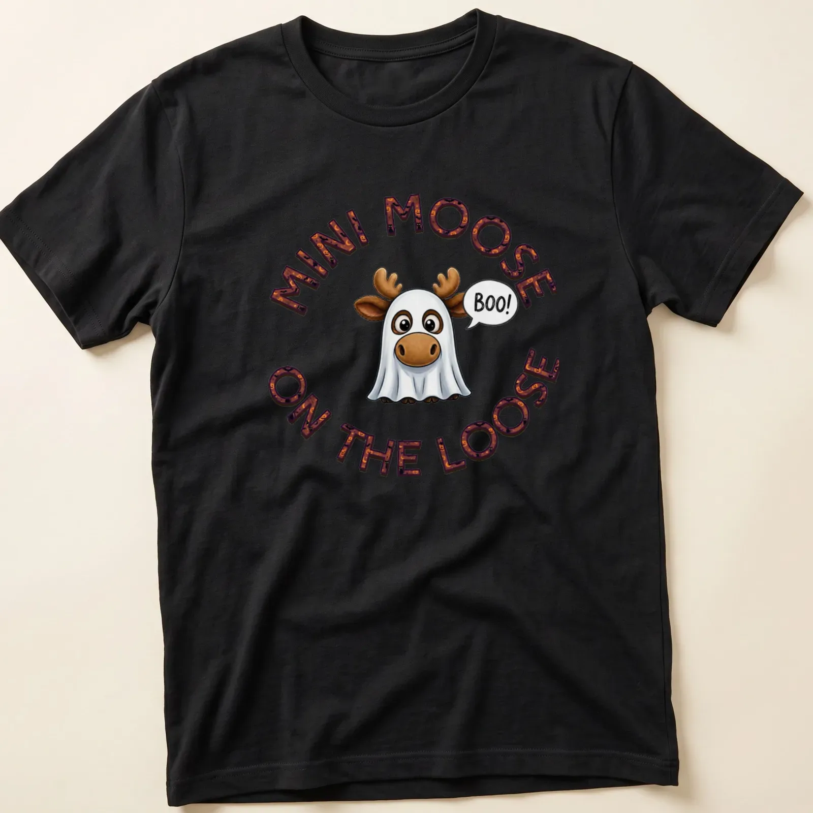 Cartoon moose in a ghost costume with the text Mini Moose On The Loose Boo Halloween — printed on a unisex t-shirt