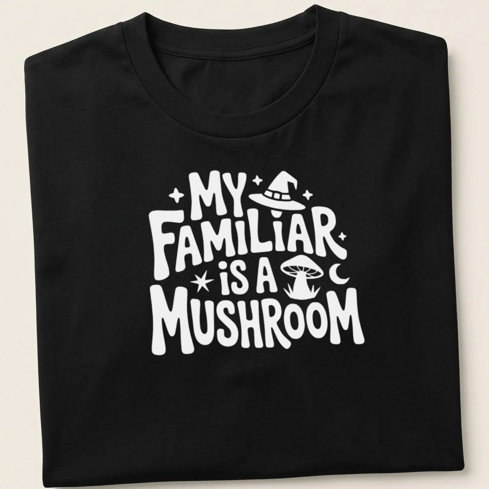 Whimsical illustration of a green and brown mushroom with the text 'My Familiar Is A Mushroom' — printed on a unisex t-shirt