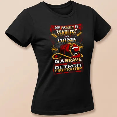 Bold graphic tee honoring a Detroit firefighter with strong typography — printed on a women's shirt