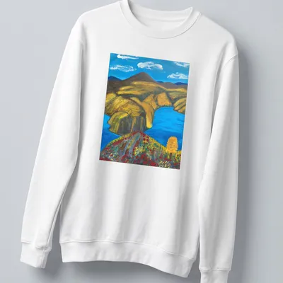 Vibrant landscape t-shirt featuring a blue river and mountains in rich colors — printed on a unisex sweatshirt