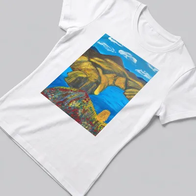 Vibrant landscape t-shirt featuring a blue river and mountains in rich colors — printed on a women's shirt