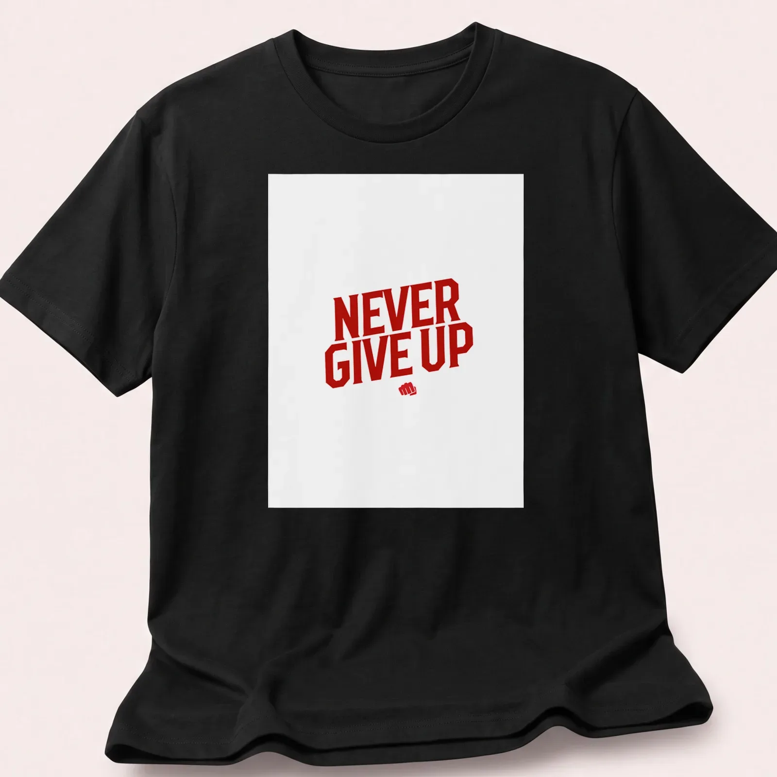 Bold typography reads 'NEVER GIVE UP' in red and white — printed on a unisex t-shirt