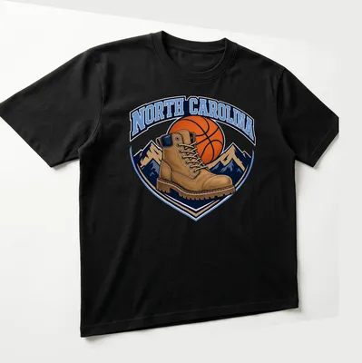 Vintage North Carolina Basketball T-shirt featuring a work boot and basketball graphic — printed on a unisex t-shirt (angled view)